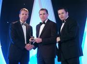 2 November 2007; Eddie Brennan of Kilkenny is presented with his award by Dave Sheerin, left, MD, Opel Ireland, in the company of Dessie Farrell, Chief Executive of the GPA, at the 2007 Opel GPA Player of the Year Awards. Gaelic Player Assoication Awards, Citywest Hotel, Conference, Leisure & Golf Resort, Saggart, Co. Dublin. Picture credit: Brendan Moran / SPORTSFILE  *** Local Caption ***