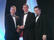 2 November 2007; Ollie Moran of Limerick is presented with his award by Dave Sheerin, left, MD, Opel Ireland, in the company of Dessie Farrell, Chief Executive of the GPA, at the 2007 Opel GPA Player of the Year Awards. Gaelic Player Assoication Awards, Citywest Hotel, Conference, Leisure & Golf Resort, Saggart, Co. Dublin. Picture credit: Brendan Moran / SPORTSFILE  *** Local Caption ***