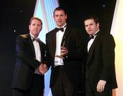 2 November 2007; Dan Shanahan of Waterford is presented with his GPA Hurler of the Year award by Dave Sheerin, left, MD, Opel Ireland, in the company of Dessie Farrell, Chief Executive of the GPA, at the 2007 Opel GPA Player of the Year Awards. Gaelic Player Assoication Awards, Citywest Hotel, Conference, Leisure & Golf Resort, Saggart, Co. Dublin. Picture credit: Brendan Moran / SPORTSFILE  *** Local Caption ***
