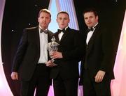2 November 2007; Leighton Glynn of Wicklow is presented with the GPA Tommy Murphy Cup Footballer of the Year award by Dave Sheerin, left, MD, Opel Ireland, in the company of Dessie Farrell, Chief Executive of the GPA, at the 2007 Opel GPA Player of the Year Awards. Gaelic Player Assoication Awards, Citywest Hotel, Conference, Leisure & Golf Resort, Saggart, Co. Dublin. Picture credit: Brendan Moran / SPORTSFILE  *** Local Caption ***