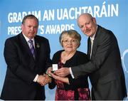 6 February 2015; Mary Hernon, Milltown GAA Club, Galway, is presented with her GAA President's Award for 2015 by Uachtarán Chumann Lúthchleas Gael Liam Ó Néill, left, and Denis O’ Callaghan, Head of AIB Branch Banking. Croke Park, Dublin. Photo by Sportsfile