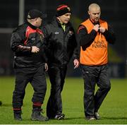 7 February 2015; Jim McCorry, Down manager, centre, leaves the field at half time with selectors John Morgan, left and Mark Copeland, right. Allianz Football League, Division 2, Round 2, Down v Roscommon. Páirc Esler, Newry, Co. Down. Picture credit: Oliver McVeigh / SPORTSFILE