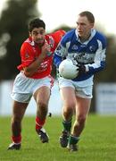 11 November 2007; Brian McCormack, Portlaoise, in action against Owen Zamboglou, left, St Patrick's. AIB Leinster Club Football Championship Quarter-Final, St Patrick's v Portlaoise, St. Brigid's Park, Dundalk, Co. Louth. Picture credit; Ray McManus / SPORTSFILE