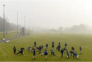 8 February 2015; The Monaghan panel warm-up ahead of the game. Allianz Football League, Division 1, Round 2, Monaghan v Cork, St Mary's Park, Castleblayney, Co. Monaghan. Picture credit: Ramsey Cardy / SPORTSFILE