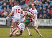 8 February 2015; Colm Boyle, Mayo, is tackled by Justin McMahon, right, and Tiernan McCann, Tyrone. Allianz Football League, Division 1, Round 2, Mayo v Tyrone, Elverys MacHale Park, Castlebar, Co. Mayo. Picture credit: David Maher / SPORTSFILE