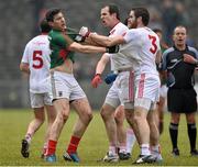 8 February 2015; Alan Freeman, Mayo, tussles with Justin McMahon and Ronan McNamee, right, Tyrone. Allianz Football League, Division 1, Round 2, Mayo v Tyrone, Elverys MacHale Park, Castlebar, Co. Mayo. Picture credit: David Maher / SPORTSFILE