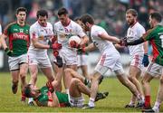 8 February 2015; Aidan O'Shea, Mayo, with, Tyrone players from left Aidan McCrory, Darren McCurry and Ronan McNamee. Allianz Football League, Division 1, Round 2, Mayo v Tyrone, Elverys MacHale Park, Castlebar, Co. Mayo. Picture credit: David Maher / SPORTSFILE