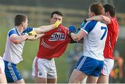 8 February 2015; Cork's John O'Rourke, battles with Monaghan's Dermot Malone, left, and Kieran Duffy. Allianz Football League, Division 1, Round 2, Monaghan v Cork, St Mary's Park, Castleblayney, Co. Monaghan. Picture credit: Ramsey Cardy / SPORTSFILE