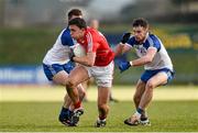 8 February 2015; Mark Collins, Cork, in action against Ryan McAnespie, left, and Fintan Kelly, Monaghan. Allianz Football League, Division 1, Round 2, Monaghan v Cork, St Mary's Park, Castleblayney, Co. Monaghan. Picture credit: Ramsey Cardy / SPORTSFILE