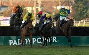8 February 2015; Carlingford Lough, extreme right, with Tony McCoy up, jumps the last behind Foxrock, second from left, with Adrian Heskin up, and Lord Windermere, second from right, with Davy Russell up, on their way to winning the Hennessy Gold Cup. Leopardstown, Co. Dublin. Picture credit: Barry Cregg / SPORTSFILE