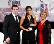 10 November 2007; Mags D'Arcy, Wexford, is presented with her Energise Camogie All-Star award by the Guest of Honour - Ireland and Leinster rugby player - Gordan D'Arcy in the company of Liz Howard, Uachtarán Chumann Camógaíochta na nGael, at the Energise Sport Camogie All-Star Awards 2007 in association with O'Neills. Citywest Hotel, Conference, Leisure & Golf Resort, Saggart, Co. Dublin. Picture credit: Ray McManus / SPORTSFILE
