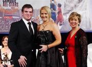 10 November 2007; Rose Collins, Limerick, is presented with her Energise Camogie All-Star award by the Guest of Honour - Ireland and Leinster rugby player - Gordan D'Arcy in the company of Liz Howard, Uachtarán Chumann Camógaíochta na nGael, at the Energise Sport Camogie All-Star Awards 2007 in association with O'Neills. Citywest Hotel, Conference, Leisure & Golf Resort, Saggart, Co. Dublin. Picture credit: Ray McManus / SPORTSFILE