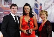 10 November 2007; Mary Leacy, Wexford, is presented with her Energise Camogie All-Star award by the Guest of Honour - Ireland and Leinster rugby player - Gordon D'Arcy in the company of Liz Howard, Uachtarán Chumann Camógaíochta na nGael, at the Energise Sport Camogie All-Star Awards 2007 in association with O'Neills. Citywest Hotel, Conference, Leisure & Golf Resort, Saggart, Co. Dublin. Picture credit: Ray McManus / SPORTSFILE