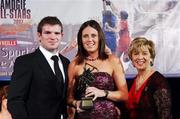 10 November 2007; Gemma O'Connor, Cork, is presented with her Energise Camogie All-Star award by the Guest of Honour - Ireland and Leinster rugby player - Gordon D'Arcy in the company of Liz Howard, Uachtarán Chumann Camógaíochta na nGael, at the Energise Sport Camogie All-Star Awards 2007 in association with O'Neills. Citywest Hotel, Conference, Leisure & Golf Resort, Saggart, Co. Dublin. Picture credit: Ray McManus / SPORTSFILE