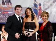 10 November 2007; Philly Fogarty, Tipperary, is presented with her Energise Camogie All-Star award by the Guest of Honour - Ireland and Leinster rugby player - Gordon D'Arcy in the company of Liz Howard, Uachtarán Chumann Camógaíochta na nGael, at the Energise Sport Camogie All-Star Awards 2007 in association with O'Neills. Citywest Hotel, Conference, Leisure & Golf Resort, Saggart, Co. Dublin. Picture credit: Ray McManus / SPORTSFILE