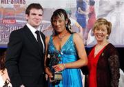 10 November 2007; Aisling Diamond, Derry, is presented with her Energise Camogie All-Star award by the Guest of Honour - Ireland and Leinster rugby player - Gordon D'Arcy in the company of Liz Howard, Uachtarán Chumann Camógaíochta na nGael, at the Energise Sport Camogie All-Star Awards 2007 in association with O'Neills. Citywest Hotel, Conference, Leisure & Golf Resort, Saggart, Co. Dublin. Picture credit: Ray McManus / SPORTSFILE