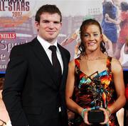 10 November 2007; Kate Kelly, Wexford, is presented with her Energise Camogie All-Star award by the Guest of Honour - Ireland and Leinster rugby player - Gordon D'Arcy at the Energise Sport Camogie All-Star Awards 2007 in association with O'Neills. Citywest Hotel, Conference, Leisure & Golf Resort, Saggart, Co. Dublin. Picture credit: Ray McManus / SPORTSFILE
