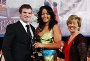 10 November 2007; Una Leacy, Wexford, is presented with her Energise Camogie All-Star award by the Guest of Honour - Ireland and Leinster rugby player - Gordon D'Arcy in the company of Liz Howard, Uachtarán Chumann Camógaíochta na nGael, at the Energise Sport Camogie All-Star Awards 2007 in association with O'Neills. Citywest Hotel, Conference, Leisure & Golf Resort, Saggart, Co. Dublin. Picture credit: Ray McManus / SPORTSFILE  *** Local Caption *** Camógaíchta