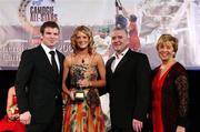 10 November 2007; Niamh Mulcahy, Cork, is presented with her Energise Camogie Young Player of the Year Award by the Guest of Honour - Ireland and Leinster rugby player - Gordon D'Arcy, left, in the company of Cormac Farrell, Business & Marketing Manager, O'Neills Irish International Sports Co., and Liz Howard, right, Uachtarán Chumann Camógaíochta na nGael, at the Energise Sport Camogie All-Star Awards 2007 in association with O'Neills. Citywest Hotel, Conference, Leisure & Golf Resort, Saggart, Co. Dublin. Picture credit: Ray McManus / SPORTSFILE