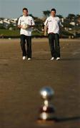 12 November 2007; Brian Murphy, left, Bohemians, and Brian Shelley, Drogheda United, walk along the beach at Malahide after a press conference hosted by the Professional Footballers' Association of Ireland, in association with Ford, to announce the nominees for the PFAI Player of the Year Awards 2007. Portmarnock Hotel and Golf Links, Portmarnock, Co. Dublin. Picture credit: David Maher / SPORTSFILE