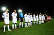 13 November 2007; A general view of the teams as they stand for the National Anthems before the match. St Patrick's Athletic v Wisla Krakow, Friendly, Richmond Park, Dublin. Picture credit; Brian Lawless / SPORTSFILE