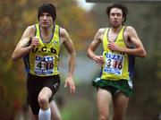 17 November 2007; James Nolan UCD A.C, left, heads out on his leg after team-mate Mick Clohisey tags him in during the IUAA Road Relays. IUAA Road Relays, NUI College, Maynooth, Co. Kildare. Picture credit; Tomas Greally / SPORTSFILE