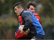 11 February 2015; Jordan Coghlan is tackled by Tom Daly during squad training. Rosemount, UCD, Belfield, Dublin. Picture credit: Matt Browne / SPORTSFILE