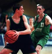 9 February 2000; Aidan O'Donnell of Carrick-On-Shannon CS in action against Christopher O'Sullivan Colaiste Mhuire Crosshaven during the Bank of Ireland Schools Cup Boys' C Final match between Colaiste Mhuire Crosshaven and Carrick-On-Shannon CS at National Basketball Arena in Tallaght, Dublin. Photo by Brendan Moran/Sportsfile