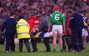 30 April 2000; Andy Moloney of Tipperary is stretchered after a collision with Ollie Moran of Limerick during the Church & General National Hurling League Division 1 Semi-Final match between Tipperary and Limerick at Semple Stadium in Thurles, Tipperary. Photo by Ray McManus/Sportsfile