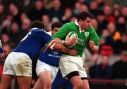 4 March 2000; Anthony Foley of Ireland in action against Andrea De Rossi of Italy during the Lloyds TSB 6 Nations match between Ireland and Italy at Lansdowne Road in Dublin. Photo by Matt Browne/Sportsfile