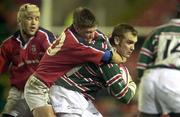 7 April 2000; Andy Goode of Leicester Tigers is tackled by Ronan O'Gara of Munster during the friendly match between Leicester Tigers and Munster at Welford Road in Leicester, England. Photo by Brendan Moran/Sportsfile