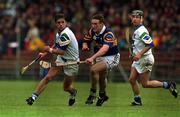 16 April 2000; Tony Browne of Waterford in action against Andy Moloney of Tipperary during the Church & General National Hurling League Division 1B Round 7 match between Waterford and Tipperary at Walsh Park in Waterford. Photo by Matt Browne/Sportsfile