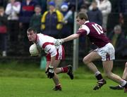 29 April 2000; Barry McGuigan of Tyrone in action against Kenneth Naughton of Galway during the All-Ireland Under 21 Football Championship Semi-Final match between Galway and Tyrone at Páirc Seán Mac Diarmada in Carrick-On-Shannon, Leitrim. Photo by Damien Eagers/Sportsfile