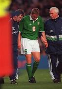 26 April 2000; Barry Quinn of Republic of Ireland leaves the field with an injury assisted by Physiotherapists Ciaran Murray, left, and Mick Byrne during the International Friendly match between Republic of Ireland and Greece at Lansdowne Road in Dublin. Photo by David Maher/Sportsfile