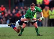 4 March 2000; Brian O'Driscoll of Ireland is tackled by Juan Francesio of Italy during the Lloyds TSB 6 Nations match between Ireland and Italy at Lansdowne Road in Dublin. Photo by Brendan Moran/Sportsfile