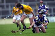 8 April 2000; Brian O'Meara of Tipperary in action against David Cuddy of Laois during the Church & General National Hurling League Division 1B Round 6 match between Tipperary and Laois at Semple Stadium in Thurles, Tipperary. Photo by Ray McManus/Sportsfile