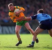 5 March 2000; Brian Roper of Donegal in action against Paul Curran of Dublin during the Allianz National Football League Division 1A Round 5 match between Dublin and Donegal at Parnell Park in Dublin. Photo by Ray McManus/Sportsfile