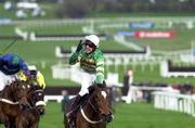 14 March 2000; Charlie Swan celebrates on Istabraq after winning the Smurfit Champion Hurdle Challenge Trophy on Day One of the Cheltenham Racing Festival at Prestbury Park in Cheltenham, England. Photo by Ray Lohan/Sportsfile