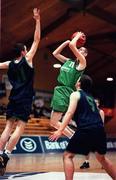 9 February 2000; Christopher O'Sullivan of Colaiste Mhuire Crosshaven shoots a basket over Shane Neary of Carrick-on-Shannon CS during the Bank of Ireland Schools Cup Boys' C Final match between Colaiste Mhuire Crosshaven and Carrick-On-Shannon CS at National Basketball Arena in Tallaght, Dublin. Photo by Brendan Moran/Sportsfile