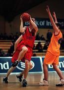 9 February 2000; Ciaran McEvilly of Colaiste Eanna in action against Simon Behan of St Fintan's Sutton during the Bank of Ireland Schools Cup Boys' A Final match between St Fintan's Sutton and Colaiste Eanna at National Basketball Arena in Tallaght, Dublin. Photo by Brendan Moran/Sportsfile