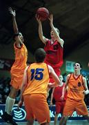 9 February 2000; Ciaran McEvilly of Colaiste Eanna in action against Michael Westbrooks, left, and John Grimes of St Fintan's Sutton during the Bank of Ireland Schools Cup Boys' A Final match between St Fintan's Sutton and Colaiste Eanna at National Basketball Arena in Tallaght, Dublin. Photo by Brendan Moran/Sportsfile