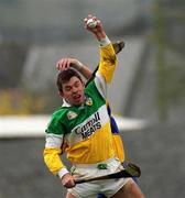 2 April 2000; Colm Cassidy of Offaly in action against Ken Ralph of Clare during the Church & General National Hurling League Division 1A Round 5 match between Offaly and Clare at St Brendan's Park in Birr, Offaly. Photo by Aoife Rice/Sportsfile