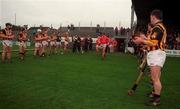 20 February 2000; The Kilkenny team form a guard of honour for Cork prior to  the Church & General National Hurling League Divission 1B match between Kilkenny and Cork at Nowlan Park in Kilkenny. Photo by Damien Eagers/Sportsfile