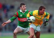 25 March 2000; Darren Fay of Meath in action against James Horan of Mayo during the Church & General National Football League Division 1B Round 6 match between Meath and Mayo at Páirc Tailteann in Navan, Meath. Photo by Ray Lohan/Sportsfile