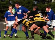 26 February 2000; Dave Clare of Young Munster in action against Ger Earls and Peter Clohessy of Young Munster during the AIB League Division 1 match between St Mary's and Young Munster at Templeville Road in Dublin. Photo by Matt Browne/Sportsfile