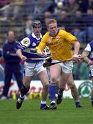8 April 2000; Declan Ryan of Tipperary in action against Paul Cuddy of Laois during the Church & General National Hurling League Division 1B Round 6 match between Tipperary and Laois at Semple Stadium in Thurles, Tipperary. Photo by Damien Eagers/Sportsfile