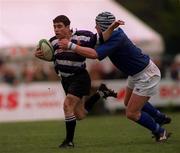 15 April 2000; Derek Hegarty of Terenure is tackled by Ray McIlreavy of St Mary's College during the AIB All-Ireland League Division 1 match between Terenure and St Mary's College at Lakelands Park in Terenure, Dublin. Photo by Damien Eagers/Sportsfile