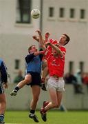 9 April 2000; Nicholas Murphy and Owen Sexton of Cork in action against Jim Gavin of Dublin during the Church & General National Football League Division 1A match between Dublin and Cork at Parnell Park in Dublin. Photo by Aoife Rice/Sportsfile