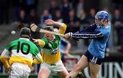 29 April 2000; Stephen Perkins of Dublin in action against Joe Errity of Offaly during the Church & General National Football League Division 1A Round 7 match between Dublin and Offaly at Parnell Park in Dublin. Photo by Brendan Moran/Sportsfile