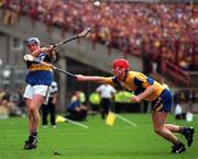 14 September 1997; Eugene O'Neill of Tipperary in action against against Brian Lohan of Clare during the Guinness All-Ireland Hurling Championship Final match between Clare and Tipperary at Croke Park in Dublin. Photo by David Maher/Sportsfile